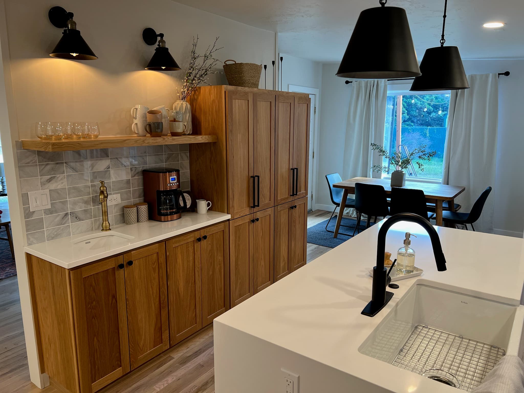 Custom Kitchen — Oak cabinetry, island, and wet bar